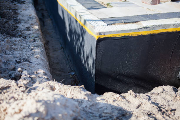 Professional Foundation Crack Repair technician working in Darby, PA